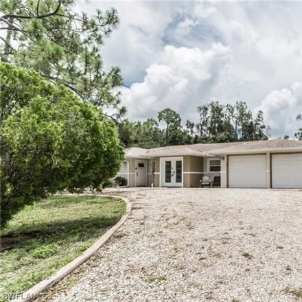 Rent this 3 bed house on 6958 Honeycomb Lane in Lee County, FL 33966