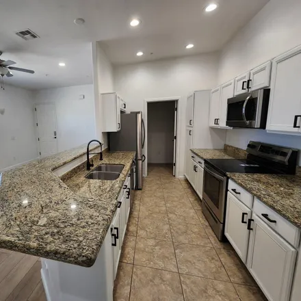 Buy this 2 bed condo on 3901 East River Road in Tucson, AZ 85718