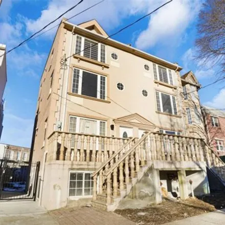 Buy this 6 bed house on 3-33 Grandview Avenue in New York, NY 11385