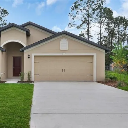 Buy this 4 bed house on 71 Raintree Place in Palm Coast, FL 32164