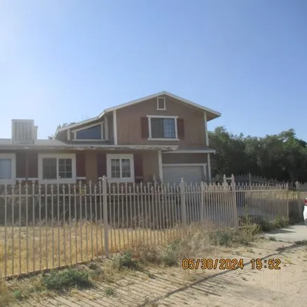 Buy this 4 bed house on 39398 164th Street East in Lake Los Angeles, CA 93591