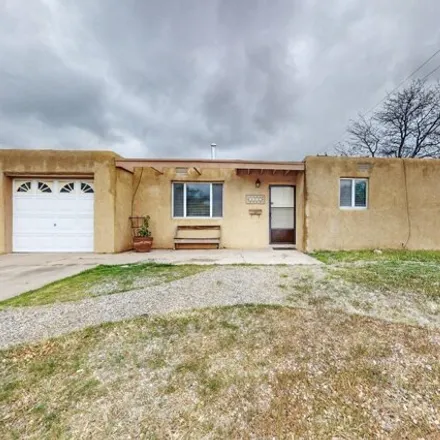 Buy this 3 bed house on 3371 Valencia Drive Northeast in Albuquerque, NM 87110