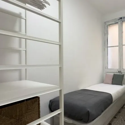 Rent this 5 bed room on Carrer Nou de la Rambla in 96, 08001 Barcelona