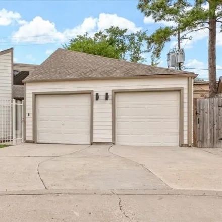 Rent this 3 bed house on 1399 Du Lock Lane in Houston, TX 77055