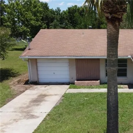 Buy this 3 bed house on 21343 Southwest Honeysuckle Street in Marion County, FL 34431