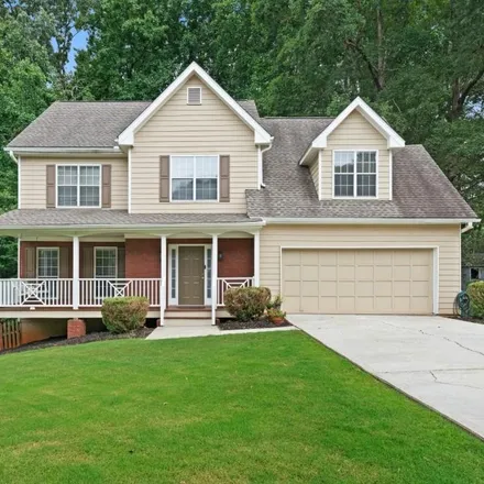 Buy this 4 bed house on 900 Springrock Drive in Gwinnett County, GA 30043