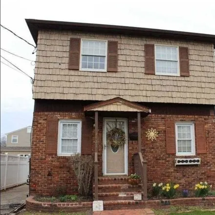 Rent this 4 bed house on 2427 Gladmore St in East Meadow, New York