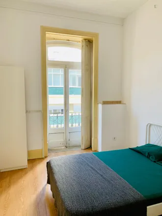 Rent this 8 bed room on Rua Palmira 40 in 1170-201 Lisbon, Portugal