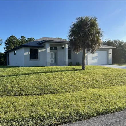 Rent this 3 bed house on 607 Lincoln Boulevard in Lehigh Acres, FL 33936