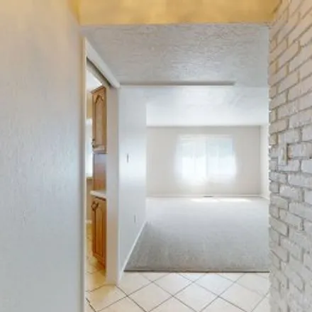 Buy this 4 bed apartment on 7704 San Francisco Road Northeast in Northeast Albuquerque, Albuquerque
