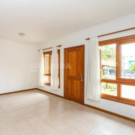 Rent this 3 bed house on Rua Ancara in Guarujá, Porto Alegre - RS
