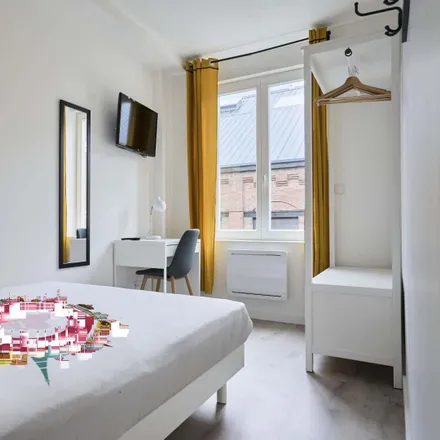 Rent this 6 bed room on 13 Rue Lestiboudois in 59130 Lille, France