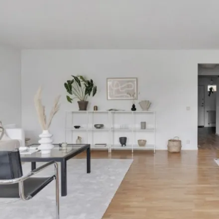 Rent this 4 bed townhouse on Per Albin Hanssons väg 61c in 215 67 Malmo, Sweden