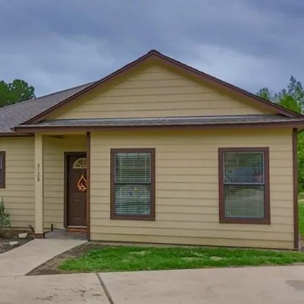 Rent this 3 bed house on Molly in Huntsville, TX 77342