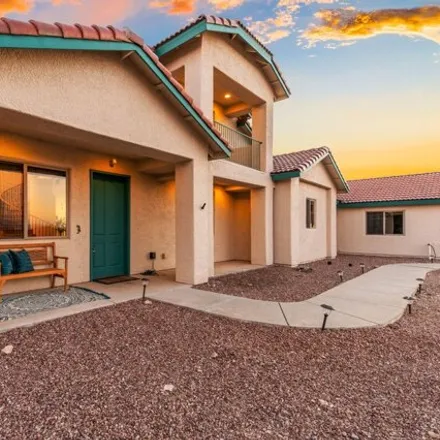 Buy this 4 bed house on 3676 East Tapia Drive in Pima County, AZ 85641