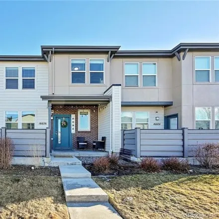 Buy this 4 bed townhouse on 16026 East Warner Drive in Denver, CO 80239