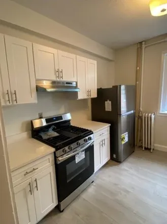 Rent this 4 bed condo on 10 in 12 Glenville Avenue, Boston