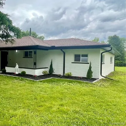Buy this 4 bed house on 6588 Norton Drive in Troy, MI 48085