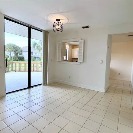 Rent this 3 bed apartment on 5716 Fox Hollow Drive in Paradise Palms, Boca Raton