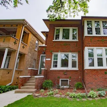 Buy this 8 bed house on 5251 West Cullom Avenue in Chicago, IL 60634