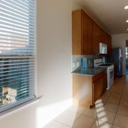 Rent this 5 bed apartment on 4911 Beechknoll Lane in Windstone Colony, Katy