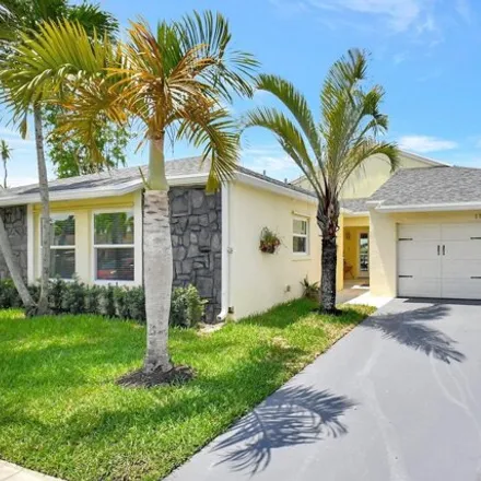 Buy this 4 bed house on 11471 Whispersound Drive in Palm Beach County, FL 33428