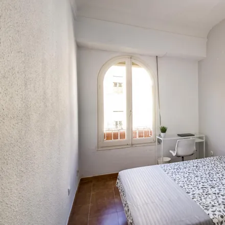 Rent this 7 bed room on Plaça de Margarita Valldaura in 46001 Valencia, Spain