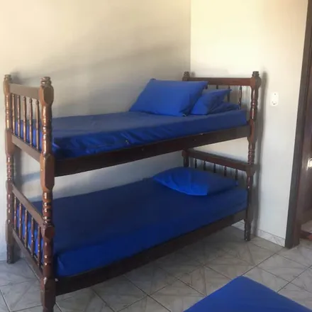 Rent this 2 bed townhouse on Praia de Martim de Sá in Jardim Bela Vista, Caraguatatuba