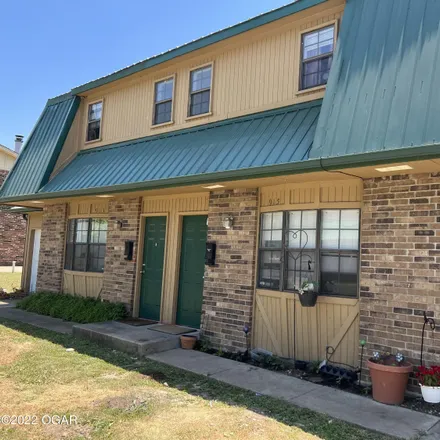 Buy this 4 bed townhouse on 932 South Saint Louis Avenue in Joplin, MO 64801