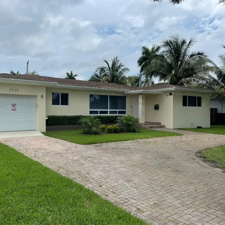 Rent this 3 bed house on 3225 Harrison Street in Hollywood, FL 33021