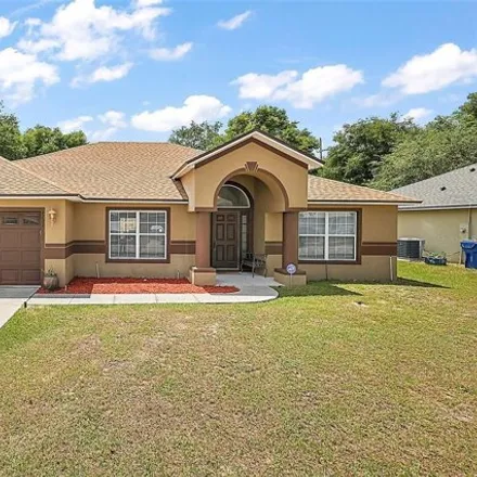 Buy this 4 bed house on 1135 Stratton Avenue in Groveland, FL 34736