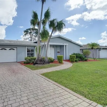 Buy this 4 bed house on 1004 Northwest 15th Avenue in Boca Raton, FL 33486