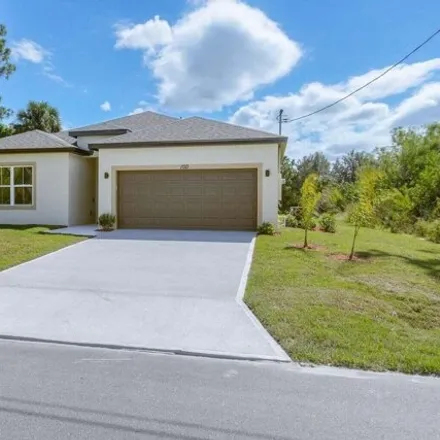 Buy this 4 bed house on 2986 Flagstaff Avenue Southeast in Palm Bay, FL 32909