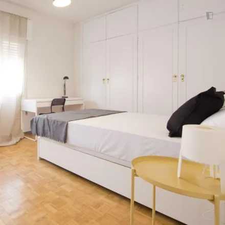 Rent this 6 bed room on Calle de Mauricio Legendre in 6, 28036 Madrid