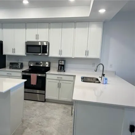 Rent this 2 bed condo on Double Eagle Circle in Collier County, FL