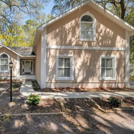 Buy this 4 bed house on 14 West Shore Drive in Brunswick, GA 31523