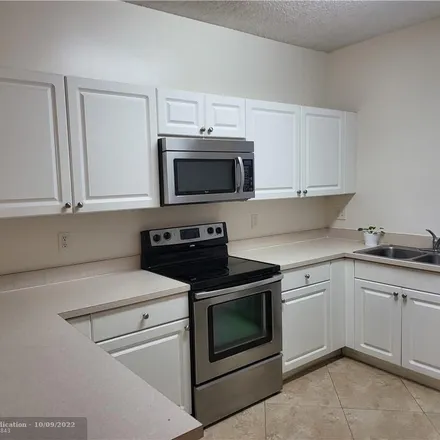 Image 4 - 4763 Northwest 57th Place, Coconut Creek, FL 33073, USA - Townhouse for rent