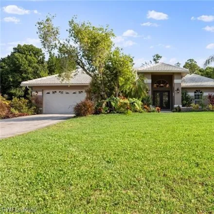 Buy this 3 bed house on 7829 Deni Drive in Lee County, FL 33917