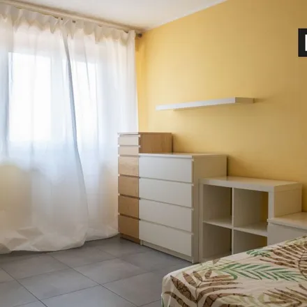 Rent this 5 bed room on Via Fabio Numerio in 20, 00181 Rome RM