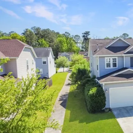 Buy this 4 bed house on 8816 Kellum Drive in North Charleston, SC 29420