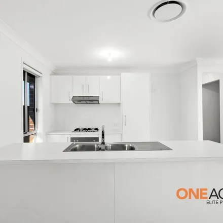 Rent this 5 bed apartment on Farmgate Crescent in Calderwood NSW 2527, Australia