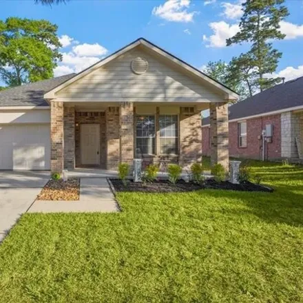 Rent this 3 bed house on 947 Crannog Way in Conroe, TX 77301