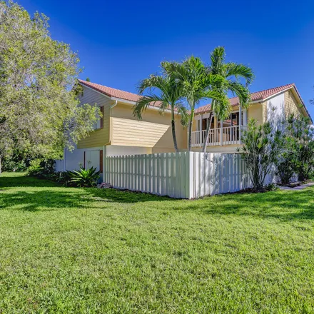 Rent this 3 bed townhouse on Seabreeze Circle in Jupiter, FL 33477