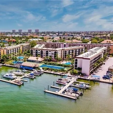 Buy this 2 bed condo on 977 Anglers Cove in Marco Island, FL 34145