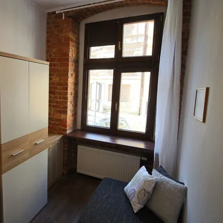 Rent this 5 bed room on Ogrodowa 16 in 61-820 Poznań, Poland