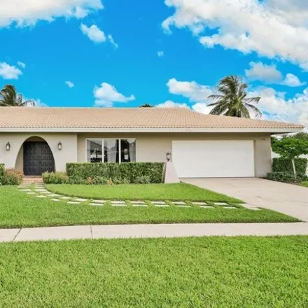 Rent this 4 bed house on 5622 Golfway Drive in Paradise Palms, Palm Beach County