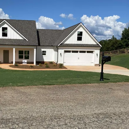 Buy this 4 bed house on 55 Alexander Lakes Drive in Putnam County, GA 31024