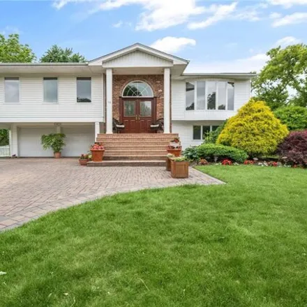 Buy this 4 bed house on 18 Peppermint Rd in Commack, New York