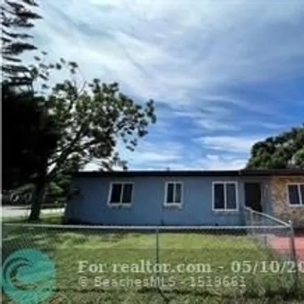 Rent this 4 bed house on 2900 Northwest 5th Court in Washington Park, Broward County