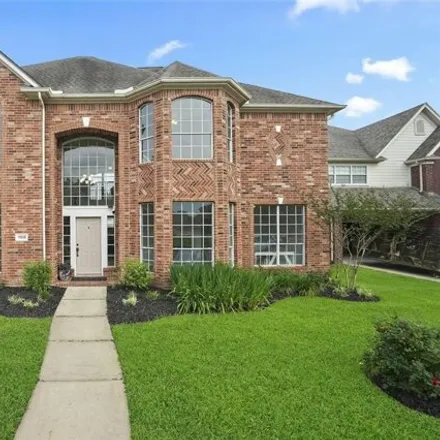 Buy this 5 bed house on 11993 Painted Canyon Drive in Harris County, TX 77377